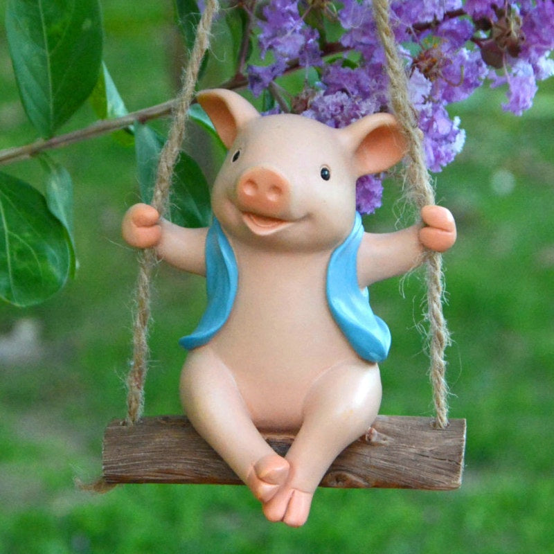 Schaukelndes Schwein Gartenfigur – Niedliche Dekofigur für Garten und Balkon