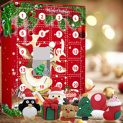 Nahaufnahme der Elch-Box mit geöffnetem Türchen, darin ein Tannenbaum-Anhänger am Ring
