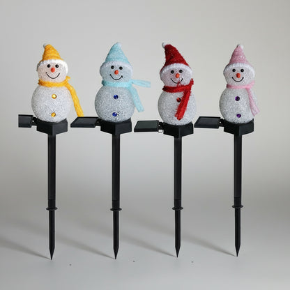 LED Solar Schneemann Gartenleuchte von lumoraX - charmantes Design für festliche Stimmung im Garten.