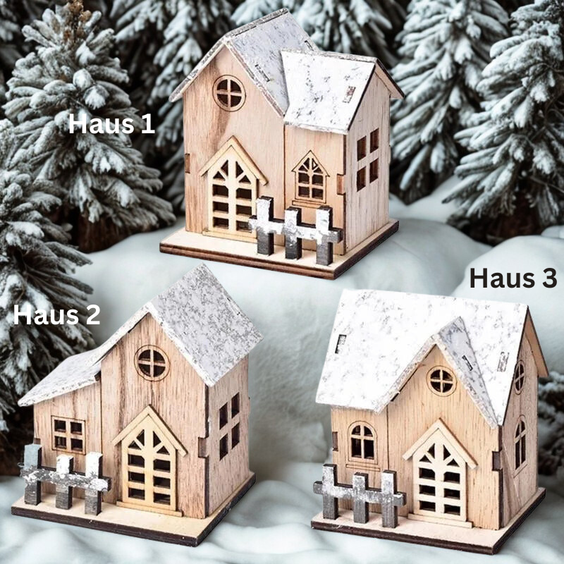 LED-Holzhaus mit Schnee-Effekt und warmweissem Licht für Weihnachtsdeko