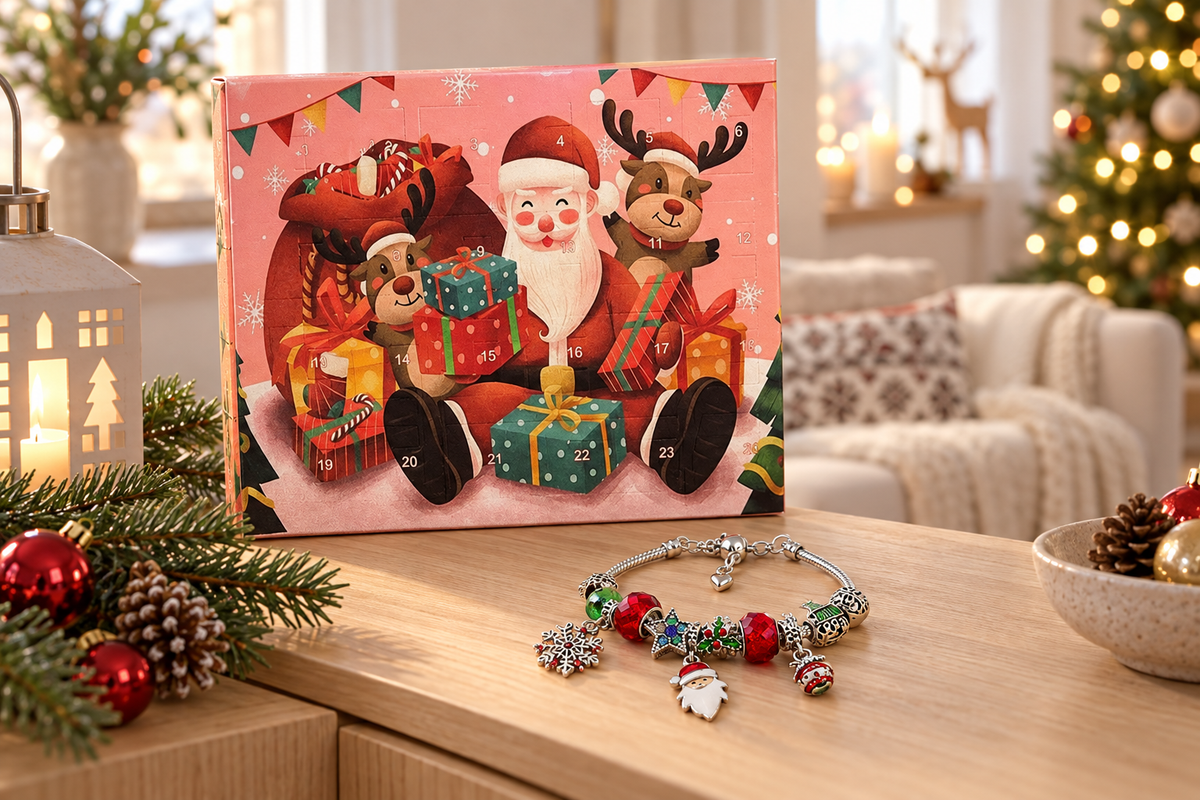 Rosa Rentier-Kalender auf einer Holzkommode neben Tannenzapfen, davor ein fertiges Armband