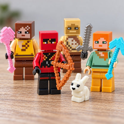 Pixel-Minifiguren im Detail: Bergmann mit rosa Spitzhacke, roter Kämpfer mit Bogen, goldene Figur, Diamant-Spitzhacke