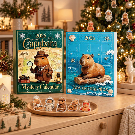 Capybara Adventskalender 2026 mit blauer und grüner Box und Acryl-Anhängern