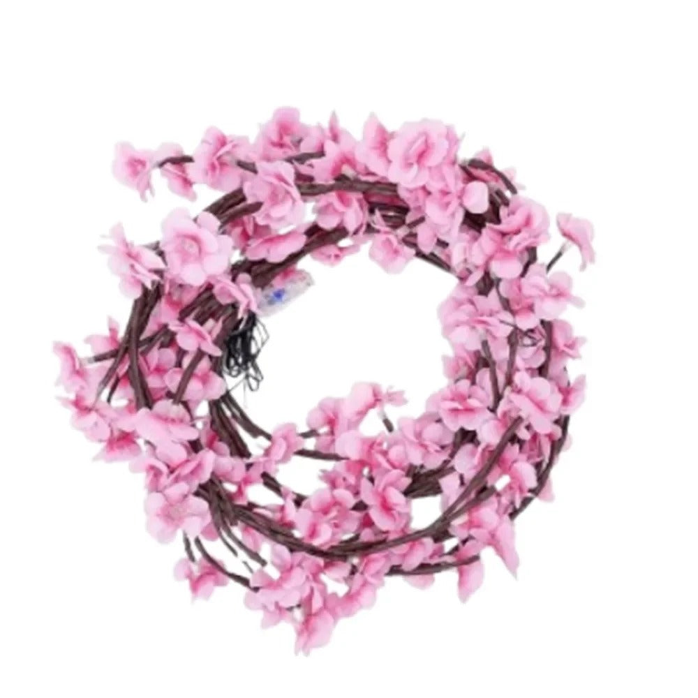 Kirschblüten Lichterkette mit 72 LED aufgerollt vor weissem Hintergrund