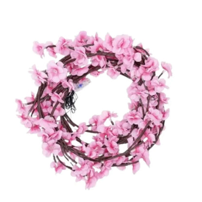 Kirschblüten Lichterkette mit 72 LED aufgerollt vor weissem Hintergrund