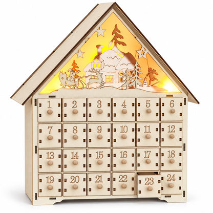 Adventskalender-Bausatz aus hellem Holz: zusammengestecktes Haus mit leuchtendem Winterdorf im Giebel und 24 Schubladen