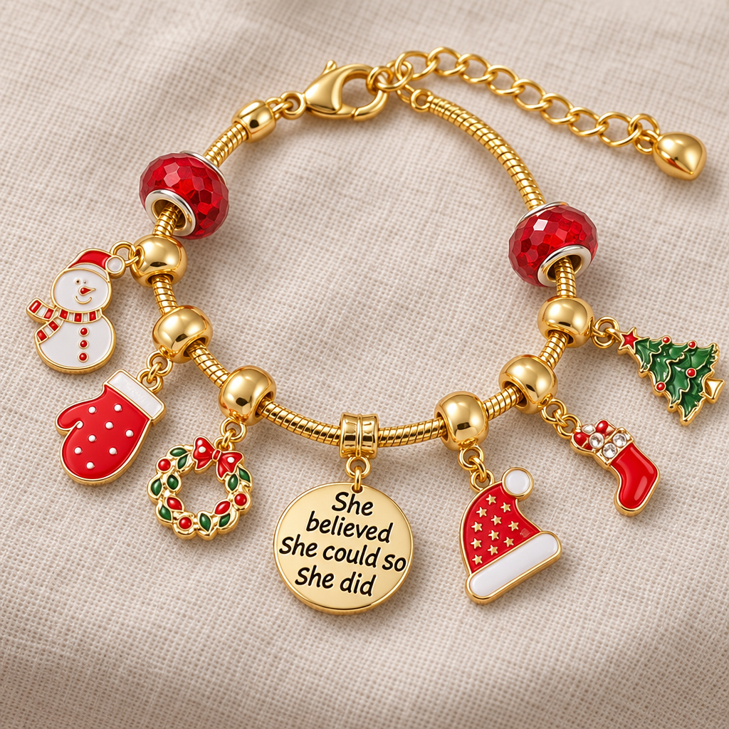 Goldenes Charm-Armband auf Leinen mit Schneemann, rotem Fäustling, Kranz, Nikolausmütze, Socke und Spruch-Plakette