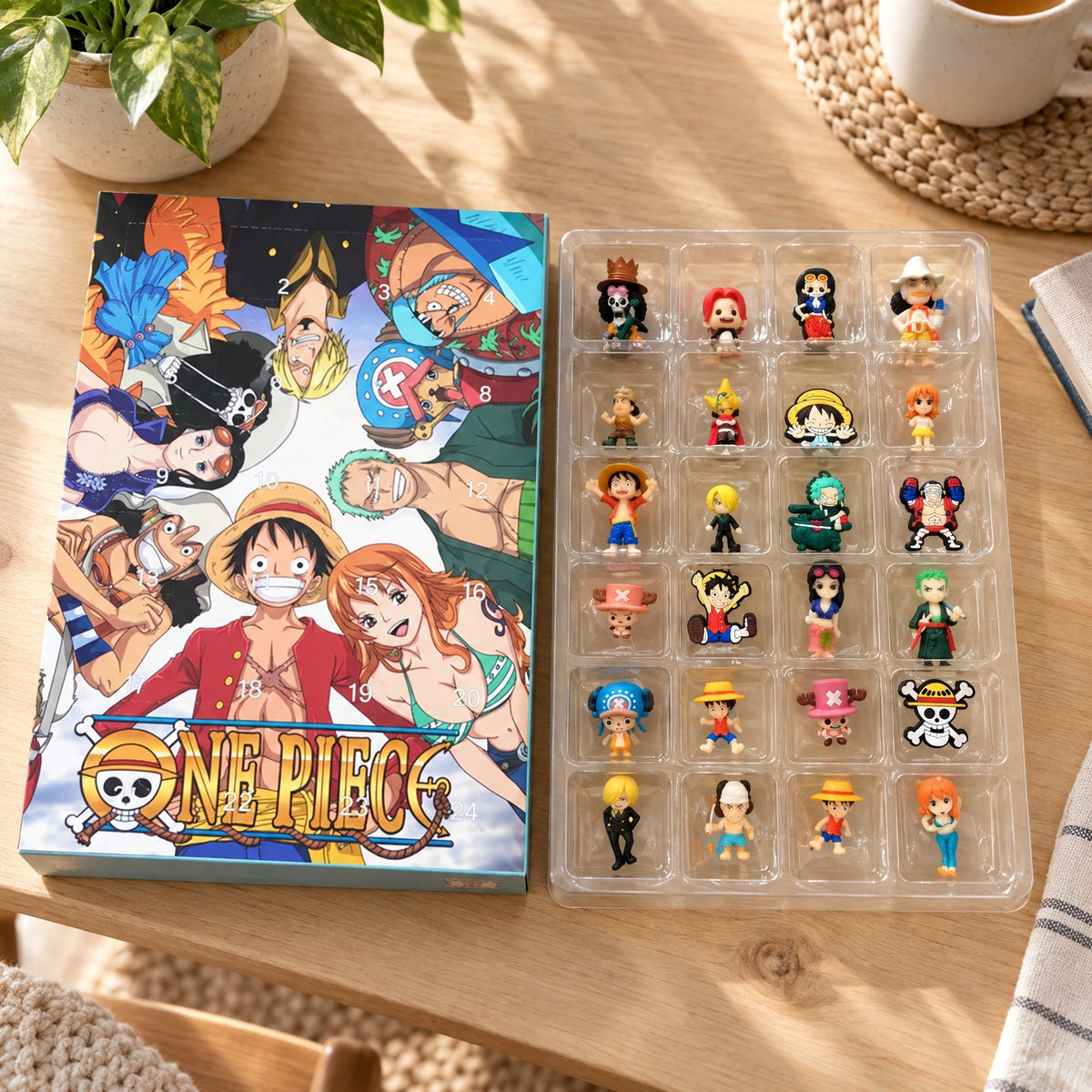 Inhalt One Piece Adventskalender: 24 Anime-Figuren im Einsatz neben der Box